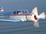 A2A_066 - Patrick flying Frans Dely in a YAK18T
